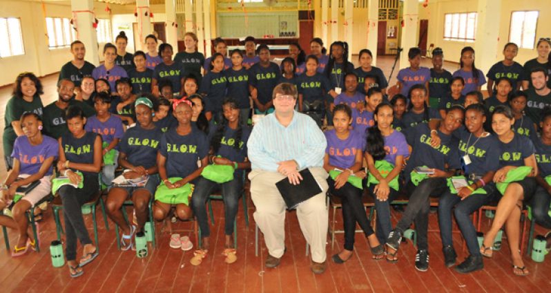 Chargé d’ Affaires at the United States Embassy in Georgetown Mr. Bryan Hunt with Glow Girls during the Kuru Kuru forum