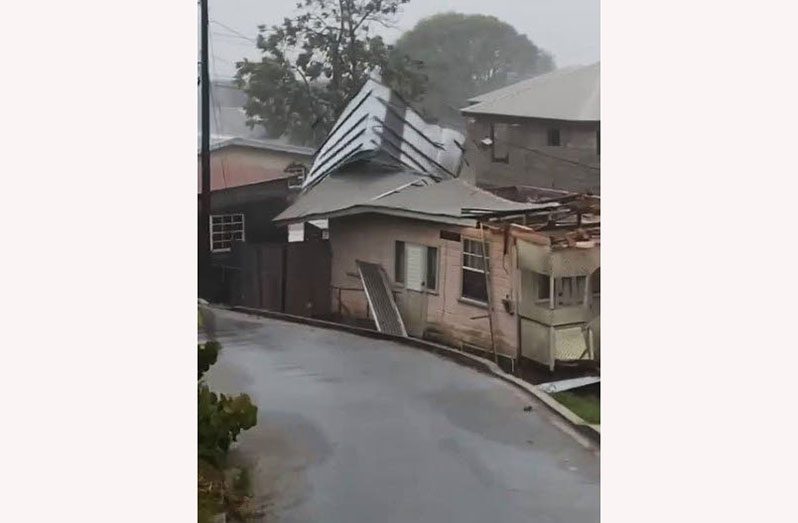 Roof flying: A screen grab of a video which circulated on social media shows the roof of a house going flying after being ripped off by winds caused by Hurricane Elsa which slammed into Barbados on Friday. The storm also affected other islands in the Eastern Caribbean including St Lucia and Grenada (Trinidad and Tobago Newsday)