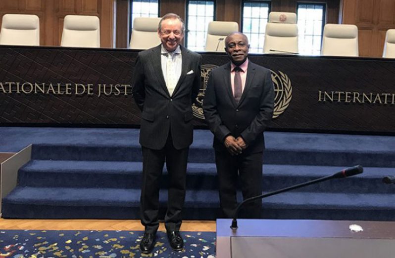 ICJ Registrar, Mr. Philippe Couvreur (l) and Minister of Foreign Affairs, Mr Carl Greenidge at the ICJ, in the Hague, during a previous meeting