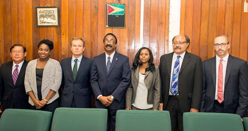 Attorney General and Legal Affairs Minister Basil Williams flanked by ARRG Assessor Gonzalo Gonzalez de Lara (immediate left), Senior Parliamentary Counsel, Joan Bond and Deputy Chief Parliamentary Counsel, Charles Fung-a-Fat. Bordering  Minister Williams on the right are FIU Acting Director Alicia Williams, CFATF’s Financial Advisor Roger Hernandez and FATF’s Senior Policy Analyst, Kevin Vandergrift