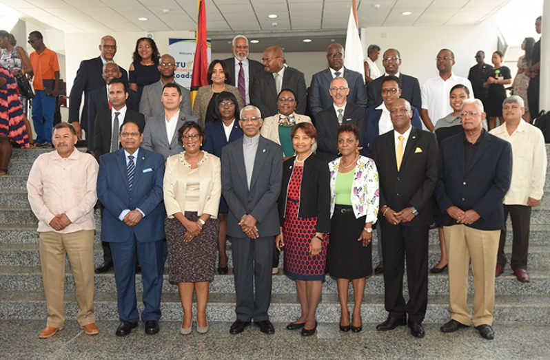 President David Granger (fourth left) and Prime Minister, Moses Nagamootoo (first from left) stand along with Caribbean Telecommunications Union (CTU) Secretary General Bernadette Lewis (fourth right); Food and Agriculture Organisation (FAO) Sub-Regional Coordinator, Lystra Fletcher-Paul (third right) and several government ministers and international representatives of the region. (Samuel Maughn photo)