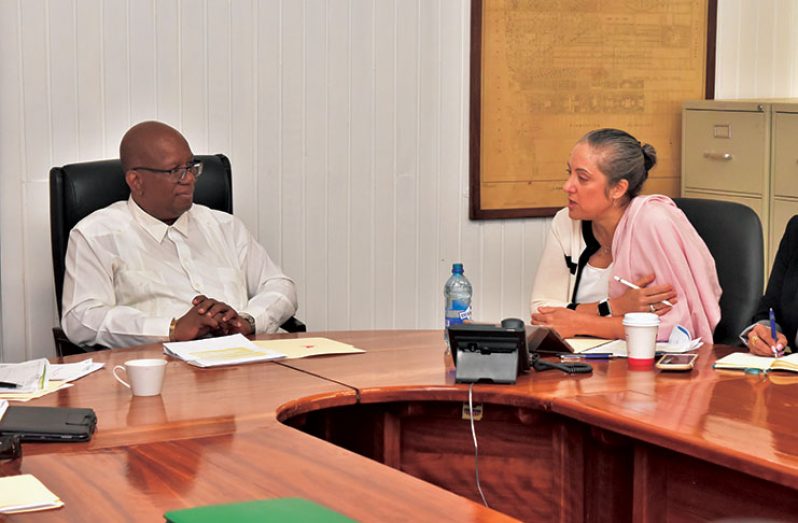 Finance Minister, Winston Jordan, meeting with the IDB’s Ms. Julie Katzman