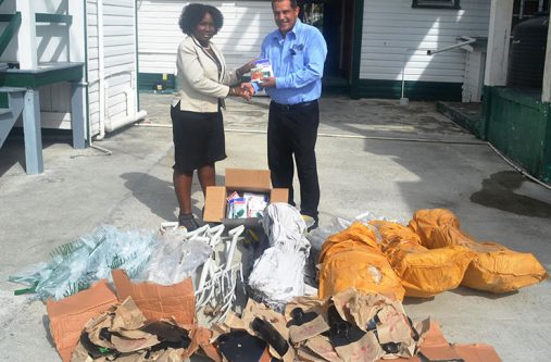 IICA’s Country Representative, Wilmot Garnett (R), hands over the agricultural items to Permanent Secretary, Ministry of Agriculture, Joylyn Nestor- Burrowes on Friday, at the Ministry of Agriculture.