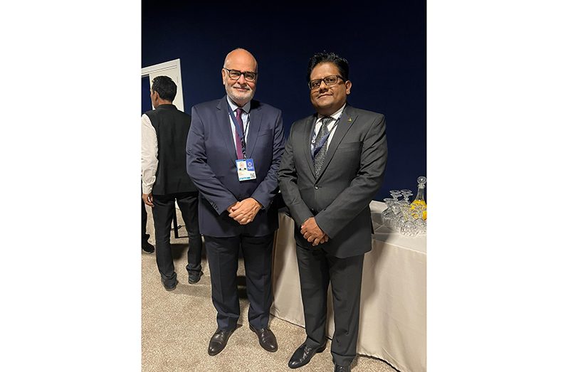 Senior Finance Minister Dr. Ashni Singh is with Afonso Bevilaqua, IMF's Executive Director for Brazil