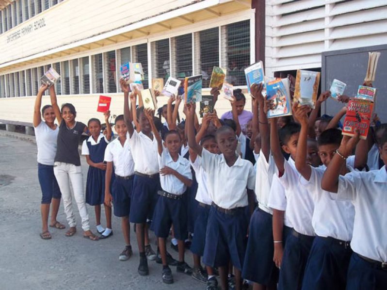 Beneficiaries show off their new books