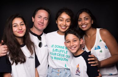 Christine Sureau-Critchlow (right)with her husband and three children