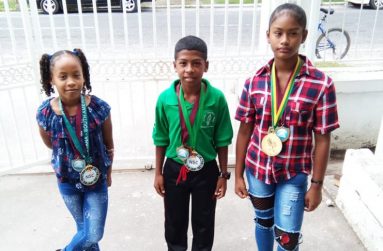 Carrington, flanked by fellow award-winning athletes
