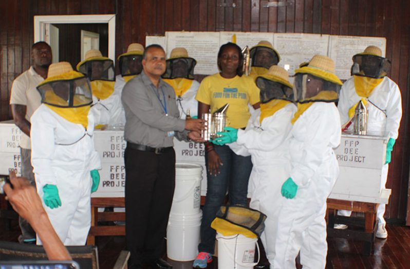 FFP’s CEO Kirk Vincent makes presentation of bee keeping items to 
participants undergoing the training