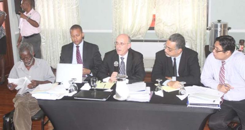 ATN’s Mr.John Audet, third left, during his presentation at the PUC hearing on the application for increase in landline rates yesterday