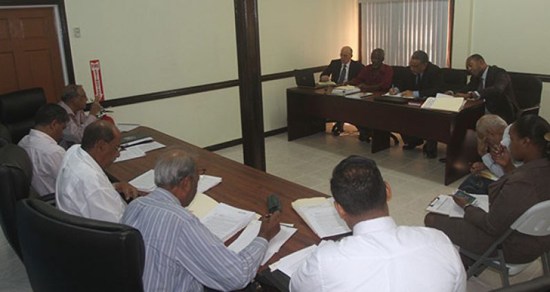 Left: Representatives of the PUC and GT&T at the hearing of the company’s request for an increase in landline rates in the conference room of PUC on Wednesday