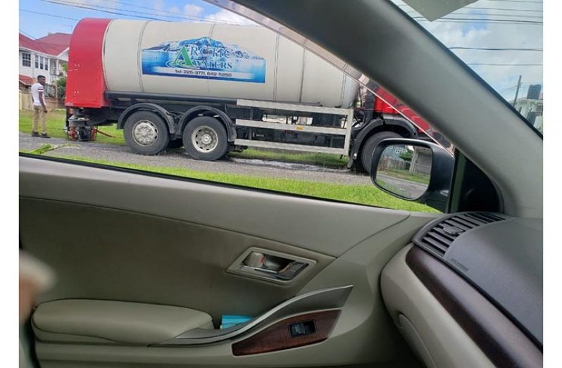 Arctic Waters truck tapping into the fire hydrant