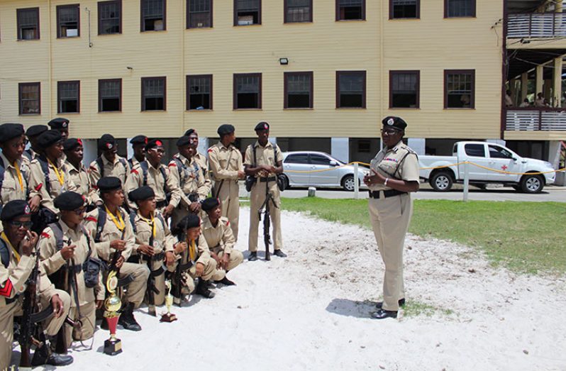 Deputy Commissioner (Operations) Ms. Maxine Graham addresses officers after a ‘run and shoot’ exercise.