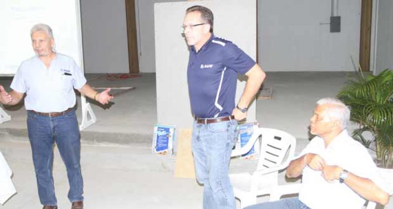 MAPEI Corporation Sales Manager, Roger Taylor, with Mike Daniels of Technical Support, enlightened the participants of MAPEI products (Photo by Sonell Nelson)