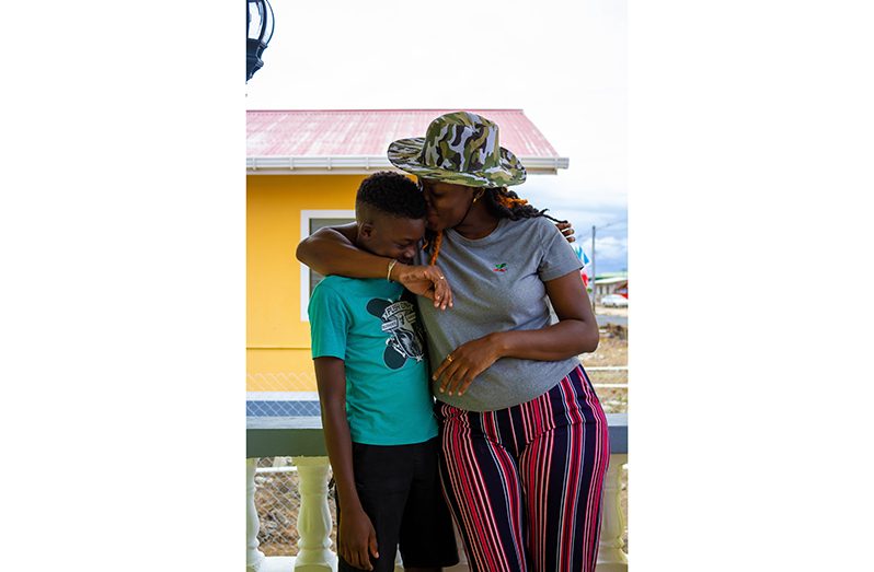 Tamica Simon and her son at their Fort Ordinance home (Shaniece Bamfield photos)