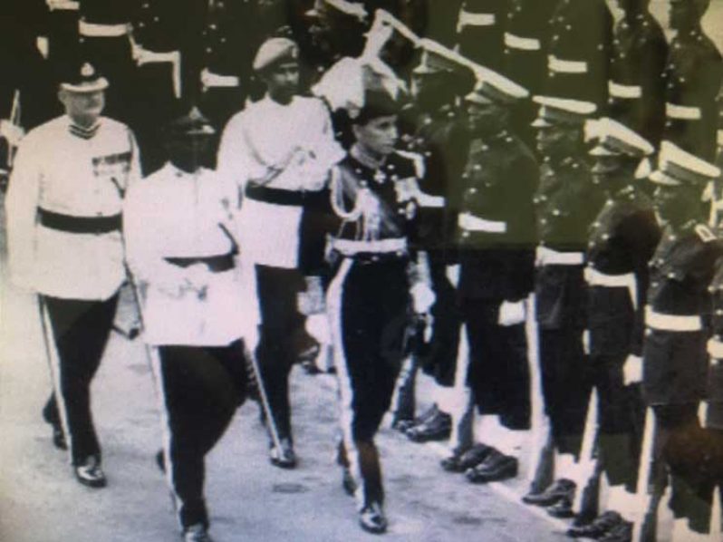 Guyana-born Governor General, Sir David Rose wearing
plumes, at centre, a former Crime Chief of the Guyana
Police Force, inspects a Guard of Honour at the Guyana
Police Force Anniversary in 1968.”