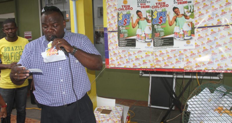Brand Coordinator, Nigel Dodson announcing the winners in the first drawing (Photos by Sonell Nelson)