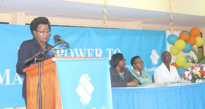 General Manager of Corporate and Management Services of Republic Bank, Ms. Denise Hobbs, addressing participants at the Career Coaching. At the head table, from left, are: Michelle Johnson, Erica Jeffrey and Phillip DaSilva