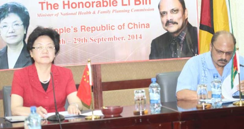 China’s Minister of Health Madam Lin Bin and Guyana’s Minister of Health Dr. Bheri Ramsaran, yesterday, at the Conference Centre Liliendaal for the signing of the MOU (Sonell Nelson photo)