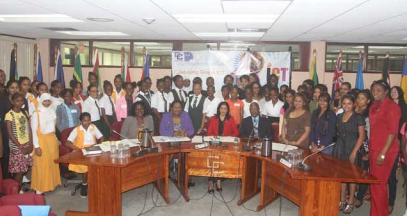 Deputy Secretary-General of CARICOM, Manorma Soeknandan, centre, with other CARICOM Secretariat officials and the girls who participated in the Secretariat’s workshop to mark International Girls in ICT Day 2014