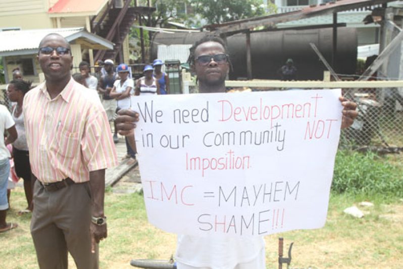 Protesters demonstrating outside the Industry/Plaisance NDC office