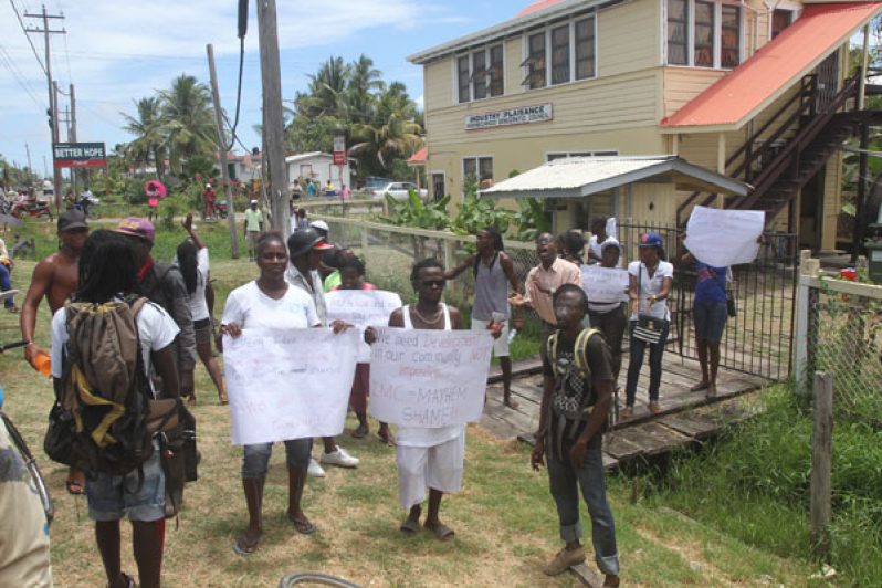 Protestors block the entrance to the Industry/ Plaisance NDC office (Photos by Sonell Nelson)