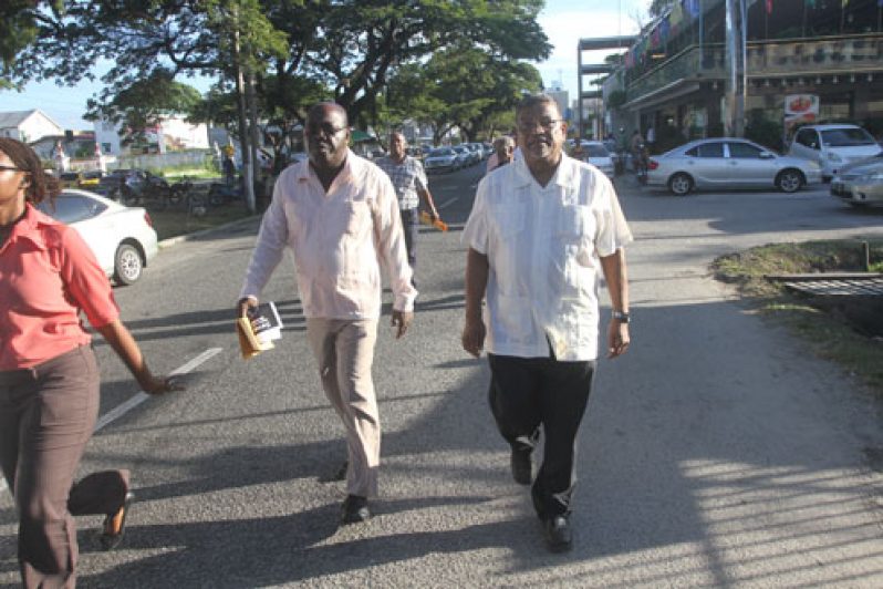 IMG 9833: Minister of Labour, Dr. Nanda Gopaul (right) and FITUG President, Mr Carvil Duncan on the WFTU Action Day march
