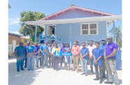 IN Men on Mission handing over the first house to Yonette Sargeant of Pomona