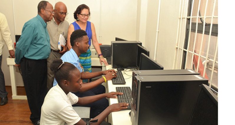 These two youngsters are eager to start working with the computer