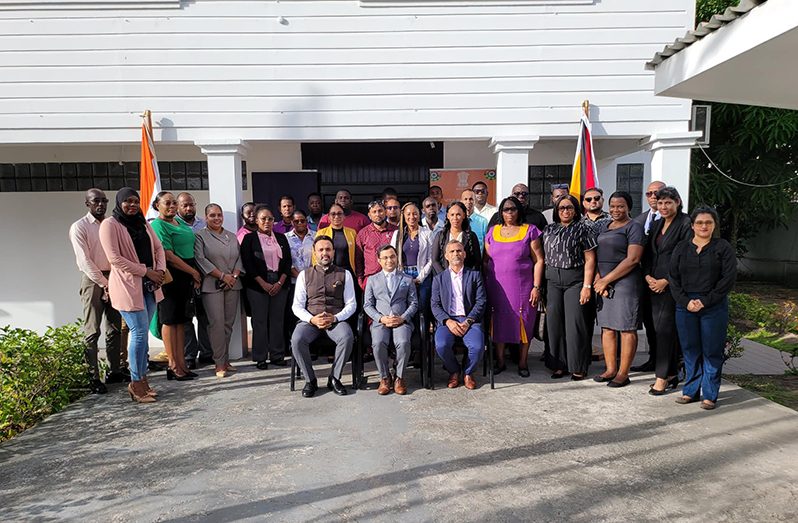 India's new High Commissioner to Guyana, Dr. Amit Telang (seated centre), flanked by the delegation of officials and experts from law enforcement agencies and various social service groups that will embark on the journey to India