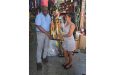 GSCL President Ian John receives one of the trophies up for grabs from Juliana Rikhee, supervisor attached to sponsors Trophy Stall