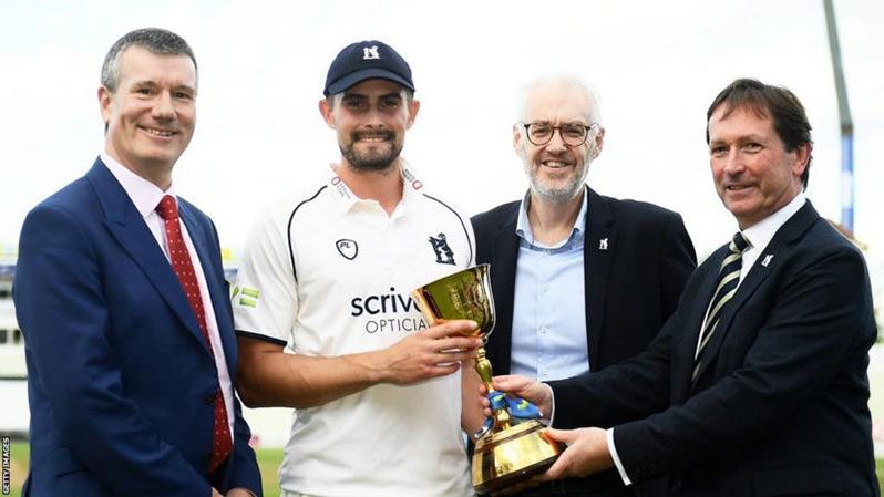 Ian Watmore (left) presented Warwickshire captain Will Rhodes, CEO Stuart Cain and chairman Mark McCafferty with the County Championship trophy last month.