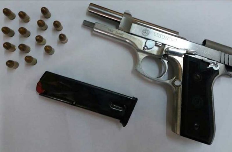 The illegal weapon and ammo found on the young man,