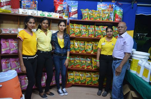 Imaam-Bacchus Imam Bacchus and Son’s staff show off several of the company’s products made in Essequibo