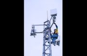 An E-Networks engineer installs 4G/5G network tower on the Essequibo Coast