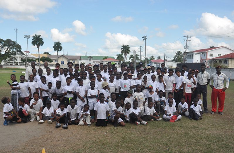 Participants and coach Garvin Nedd along with technical director Mark Harper