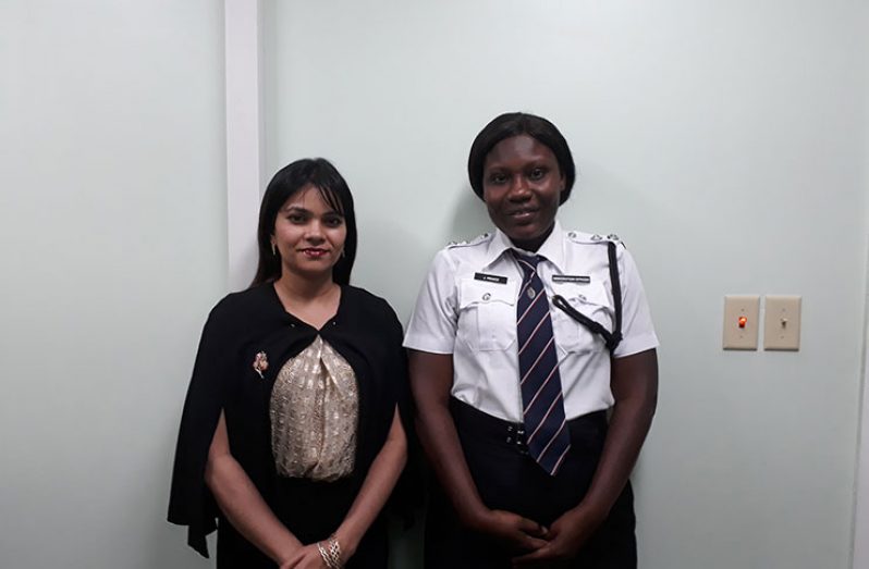 Legal Officer, Frontiers Division, Ministry of Foreign Affairs, Ms. Dianna Khan (left) and Officer-in-Charge of Ports of Entry, Immigration Department of the Guyana Police Force, Assistant Superintendent, Ms. Jeanette Prince at the Department of Citizenship