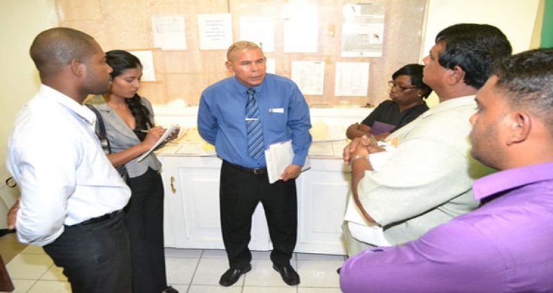 Minister of Public Health, Dr. George Norton interacting with some of the staff at the West Demerara Regional Hospital (WDRH), Region Three in the presence of Regional Executive Officer (REO) Azam Mohamed and Regional Health Officer, Vasha Bachan