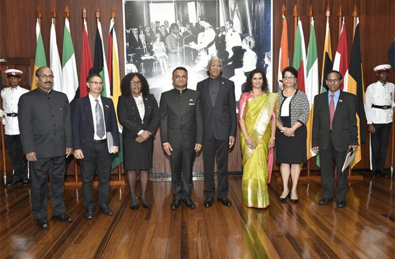 President David Granger and High Commissioner of the Republic of India to Guyana Dr. K.J. Srinivasa (centre) standing with members of their delegation. Among them are Guyana’s Minister of Foreign Affairs, Dr. Karen Cummings (third from left) and Director-General of the Ministry of Foreign Affairs, Audrey Waddell (second from right) 
(MoTP Photos)