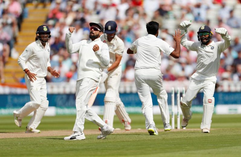 India’s Virat Kohli celebrates after Ravichandran Ashwin bowled England's Alastair Cook. (Action Images via Reuters/Andrew Boyers)