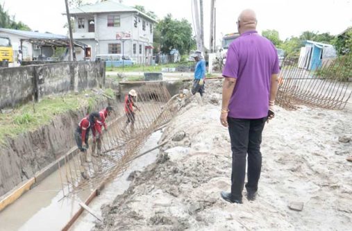 Minister of Public Works, Bishop Juan Edghill inspecting the ongoing drainage works of the ‘E’ Field road project