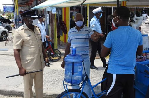 Commander of Regional Division Five, Senior Superintendent, Edmond Cooper and his team interacting with residents of the division