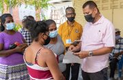 Minister of Housing and Water, Collin Croal, interacts with residents who have been occupying lands at Plantation Hope – Cum Annexis for decades (DPI photo)