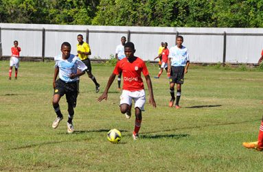 Flashback! Paradise Invaders (red & white) controlling play in their match against Mahaicony Thunder Hawks on July 17.