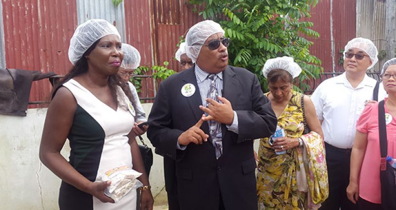 OAA CARICOM Outreach Director Wesley Kirton addressing the team of businessmen and women in the presence of Global Seafood Distributors CEO Allison Butters-Grant