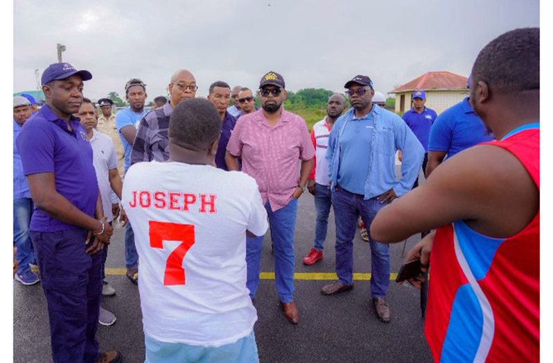 President Dr Mohamed Irfaan Ali meeting with residents at the Amelia’s Ward recreational space on Monday morning (Office of the President Photos)