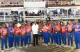 Commander-in-Chief, President Irfaan Ali, hands over the winning trophy to GPF skipper, Deputy Commissioner (Administration), Ravindradath Budhram in the presence of the other players.