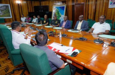 President Dr Irfaan Ali along with Ministers in discussion with football officials for the One Guyana President’s Cup