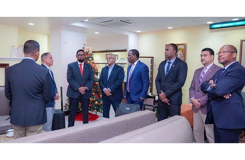 On arrival at the Grantley Adams International Airport on Monday ahead of the CARICOM-Cuba Summit and RSS meeting, President Dr. Irfaan Ali and his high-level team had a brief engagement with the Prime Minister of Belize, John Briceño (Office of the President photo)
