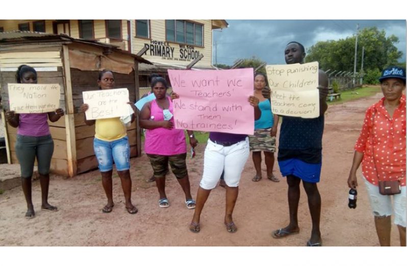 Parents at Ituni participating in protest action on Wednesday in front of the Howell Wilson Primary School