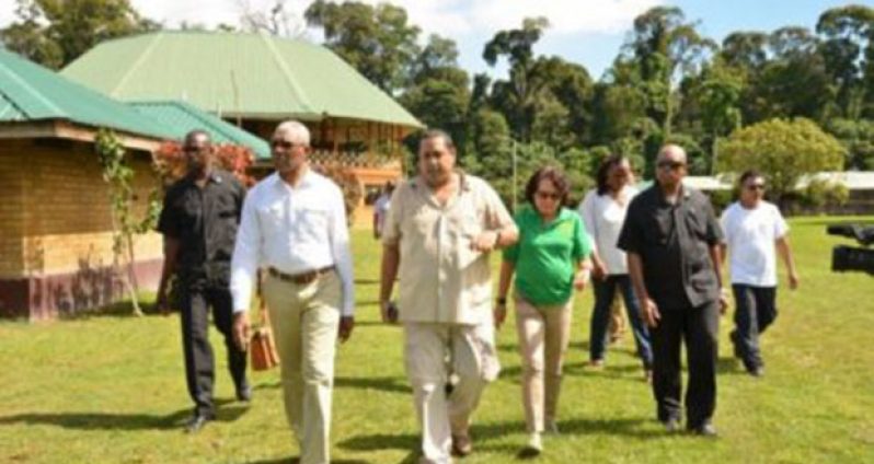President David Granger (left) and First Lady, Mrs. Sandra Granger (third right) being given a guided tour of the Iwokrama River Lodge and Research Centre by Chief Executive Officer, Dr. Dane Gobin (second left)